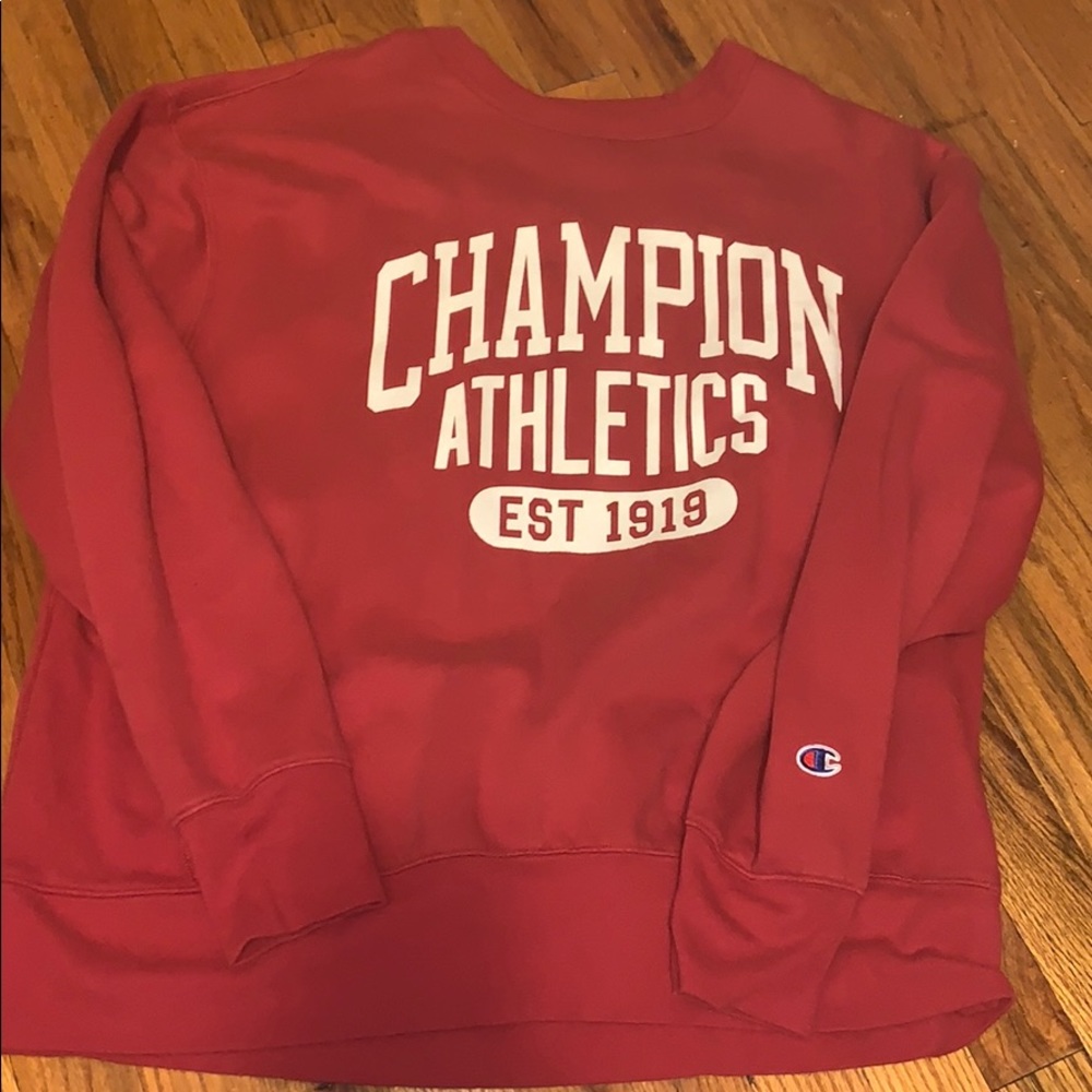 Red champion sweatshirt.